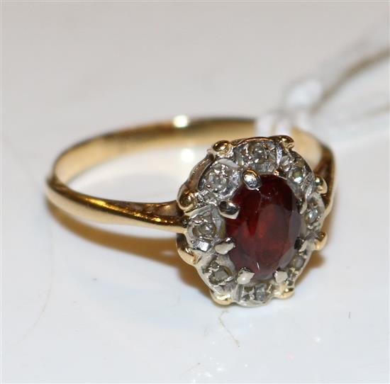 Hessonite garnet and diamond ring in 18ct gold